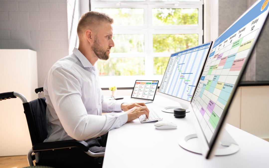 Man scheduling on dual monitors with a Gantt chart on one and a calendar on the other.